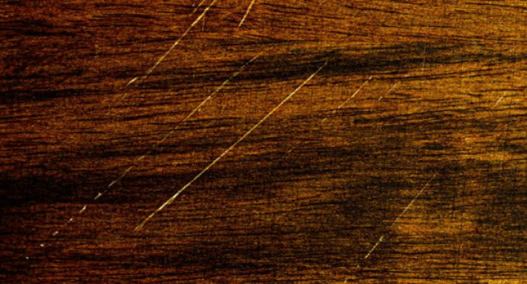Several scratches on a wooden floor